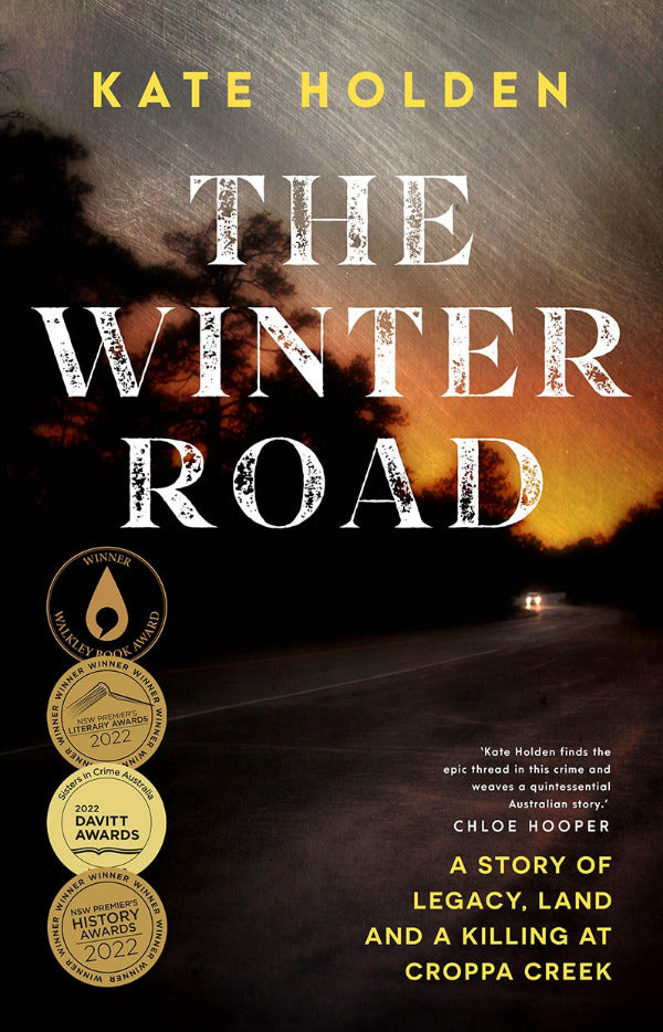 Book cover of 'The Winter Road' by Kate Holden with a dark road scene and awards displayed.