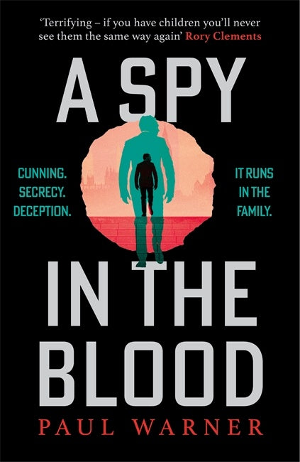 Book cover of 'A Spy in the Blood' by Paul Warner with a silhouette of a person and text on a black background.