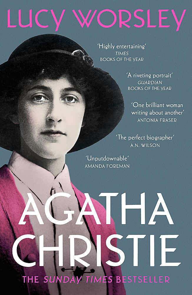 Book cover for 'Agatha Christie' by Lucy Worsley, featuring a vintage black-and-white portrait of Agatha Christie in a dark hat and pink clothing against a muted blue-gray background, with large white and pink title text and several review quotes.