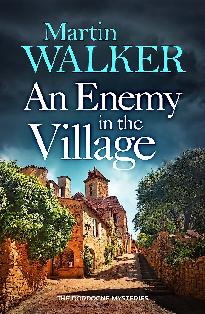 Book cover of 'An Enemy in the Village' by Martin Walker with a village scene.