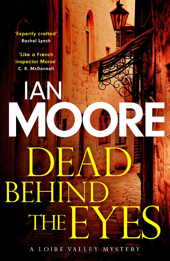 Book cover of 'Dead Behind the Eyes' by Ian Moore with a street scene in the background.
