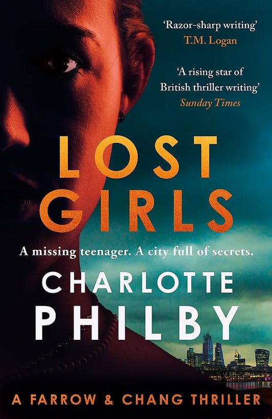 Book cover of 'Lost Girls' by Charlotte Philby with a silhouette and city skyline.
