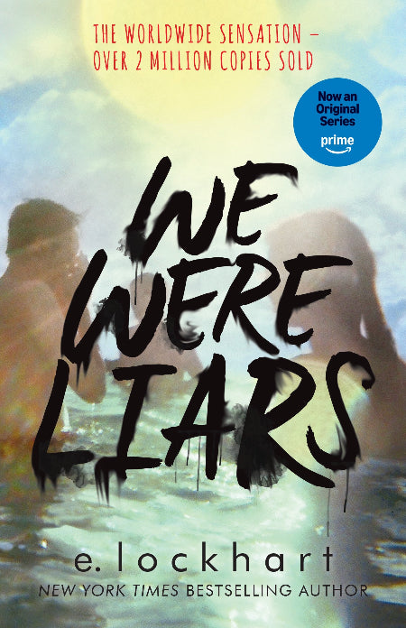Book cover of 'We Were Liars' with a blurred background of two people.
