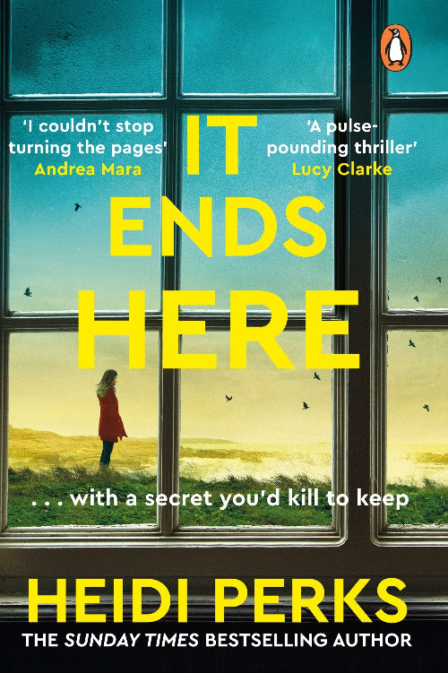 Book cover for 'It Ends Here' by Heidi Perks, featuring a large yellow title over a scene of a woman standing by a window looking out onto a grassy field at sunset. The Penguin logo is visible in the top right corner.