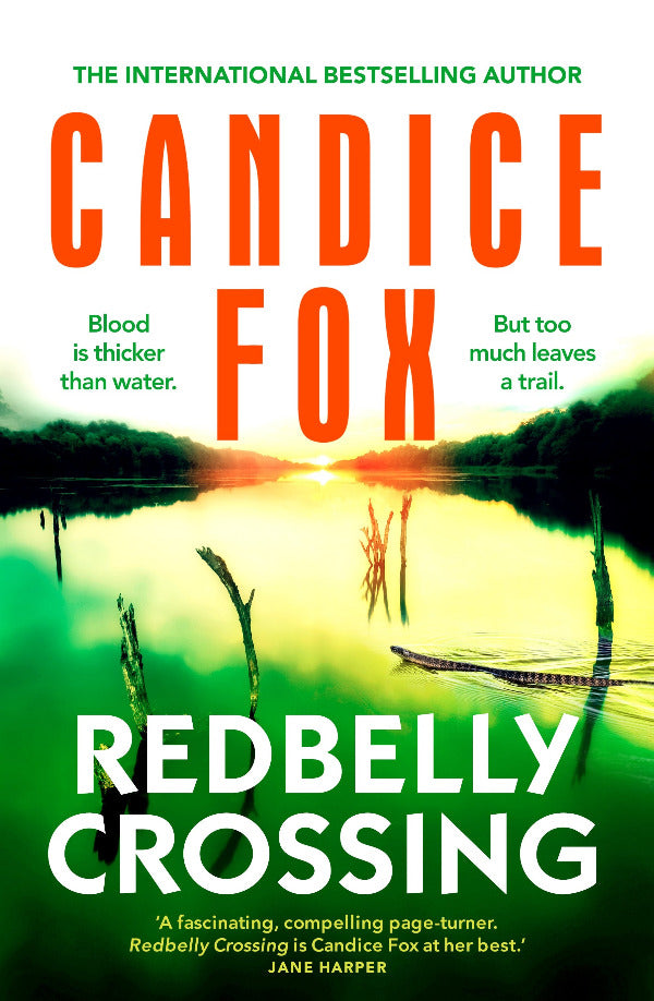 Book cover of 'Redbelly Crossing' by Candice Fox with a sunset over water scene.