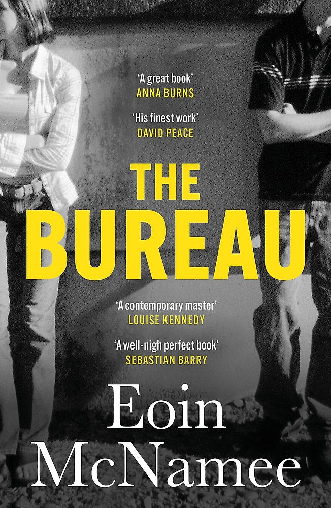 Book cover of 'The Bureau' by Eoin McNamee with text quotes and two people in the background.