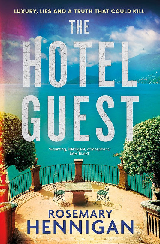 Book cover of 'The Hotel Guest' by Rosemary Hennigan with a scenic background.