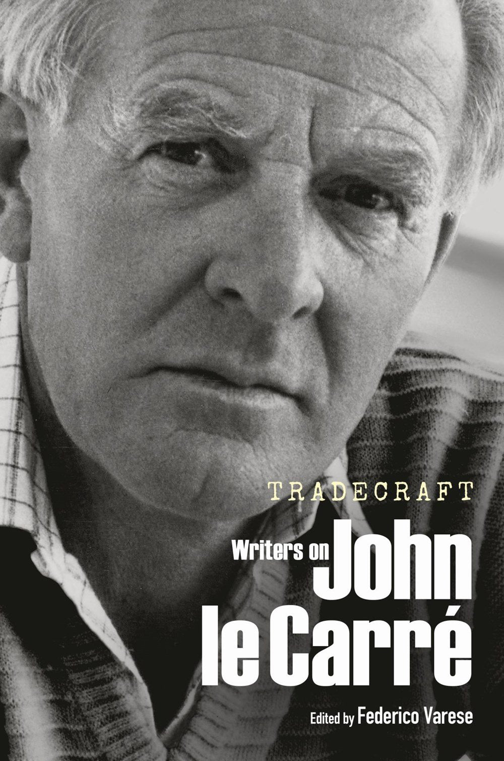 Book cover featuring a black and white portrait of a man with text about 'Tradecraft: Writers on John le Carré'.