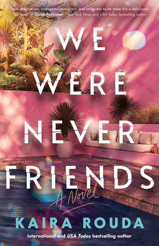 Book cover of 'We Were Never Friends' by Kaira Rouda with a pool and palm trees design.
